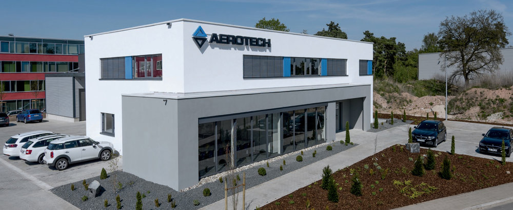 Aerotech Expands our Capabilities with a Dedicated Building in Germany    On March 2, 2016 Aerotech celebrated the groundbreaking for our new Aerotech Germany office in Fürth, Germany. Construction and relocation to the new building has been completed and the opening ceremony was held on May 18th, 2017.
